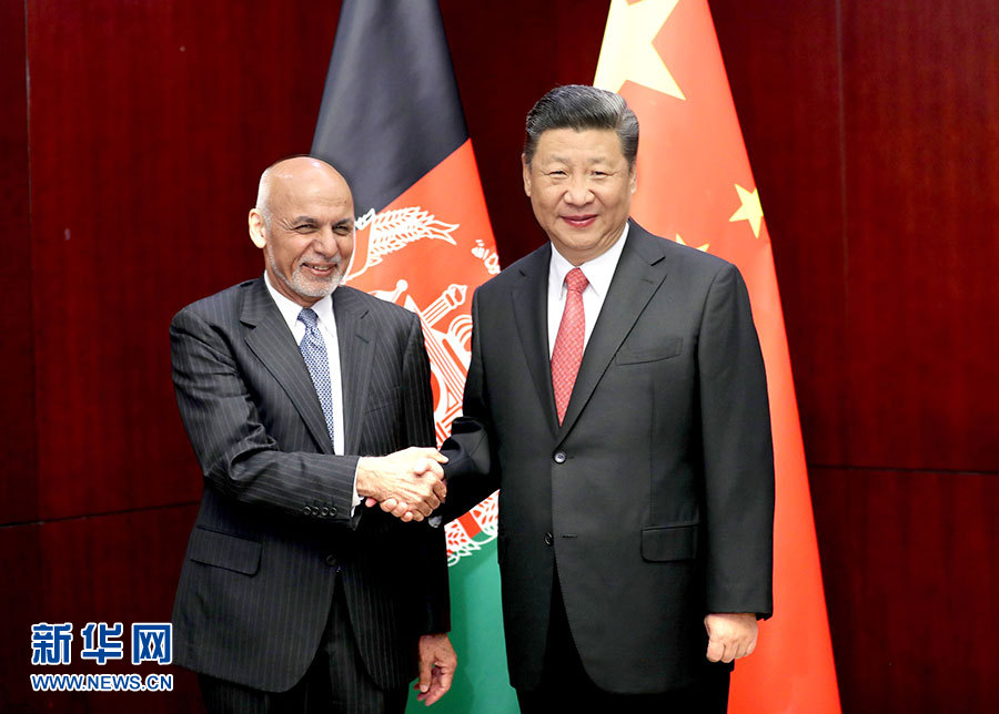 6月8日，国家主席习近平在哈萨克斯坦首都阿斯塔纳会见阿富汗总统加尼。 新华社记者 丁林 摄