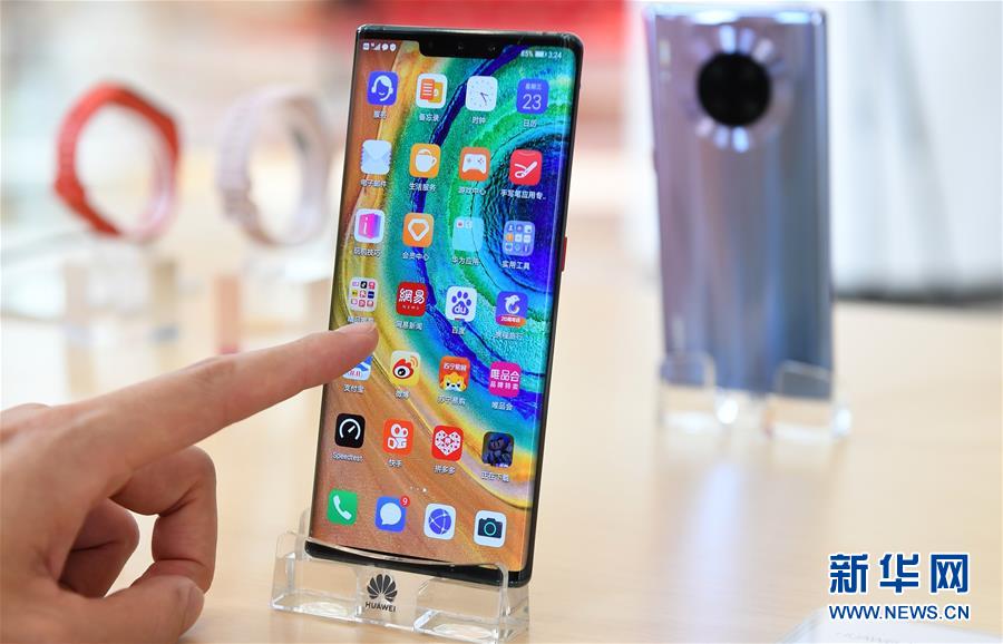 （经济）（1）华为2019年手机销量突破2亿台