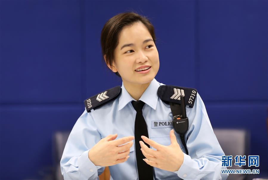 （港澳台·图文互动）（1）“希望社会尽快平稳，疫情快点过去”——一位香港女警最想收到的妇女节礼物