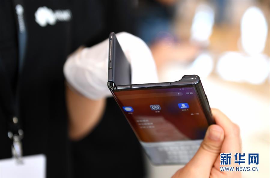 （经济）（6）华为2019年手机销量突破2亿台