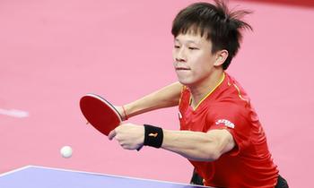 （新华视界）乒乓球——世乒赛团体赛：中国男队晋级16强