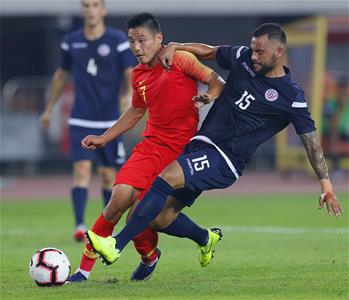 足球——世预赛：中国队胜关岛队